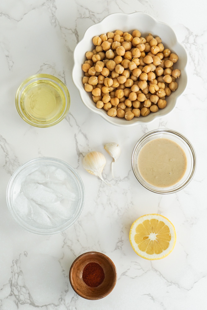 Hummus ingredients on marble counter