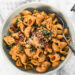 Sun Dried tomato protein pasta with sausage in a bowl