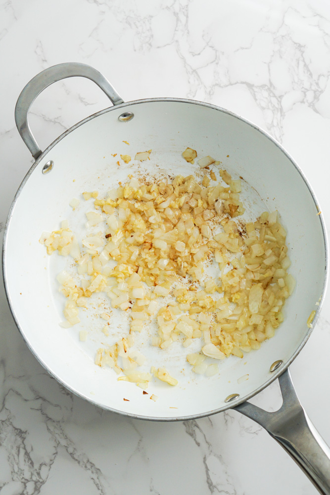 sautéed onion and garlic in pan