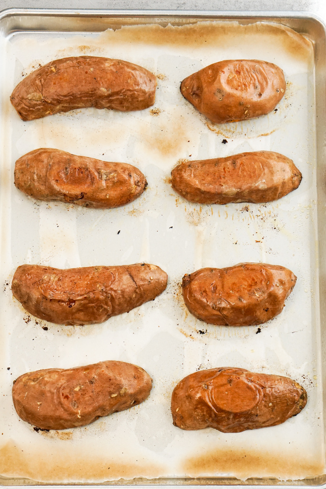 baked sweet potatoes on baking tray